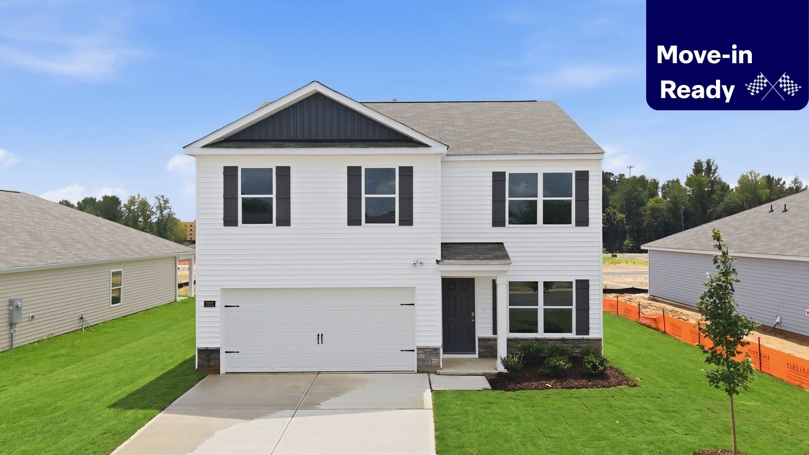 front view of two story home with white and navy