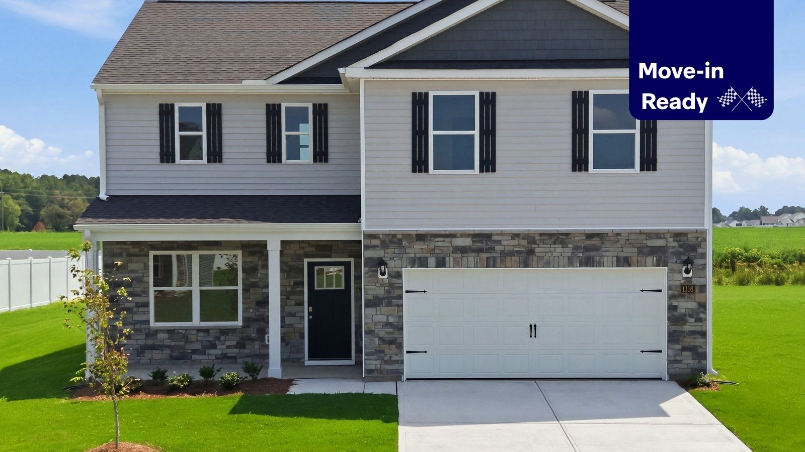 exterior of two story home with two car garage