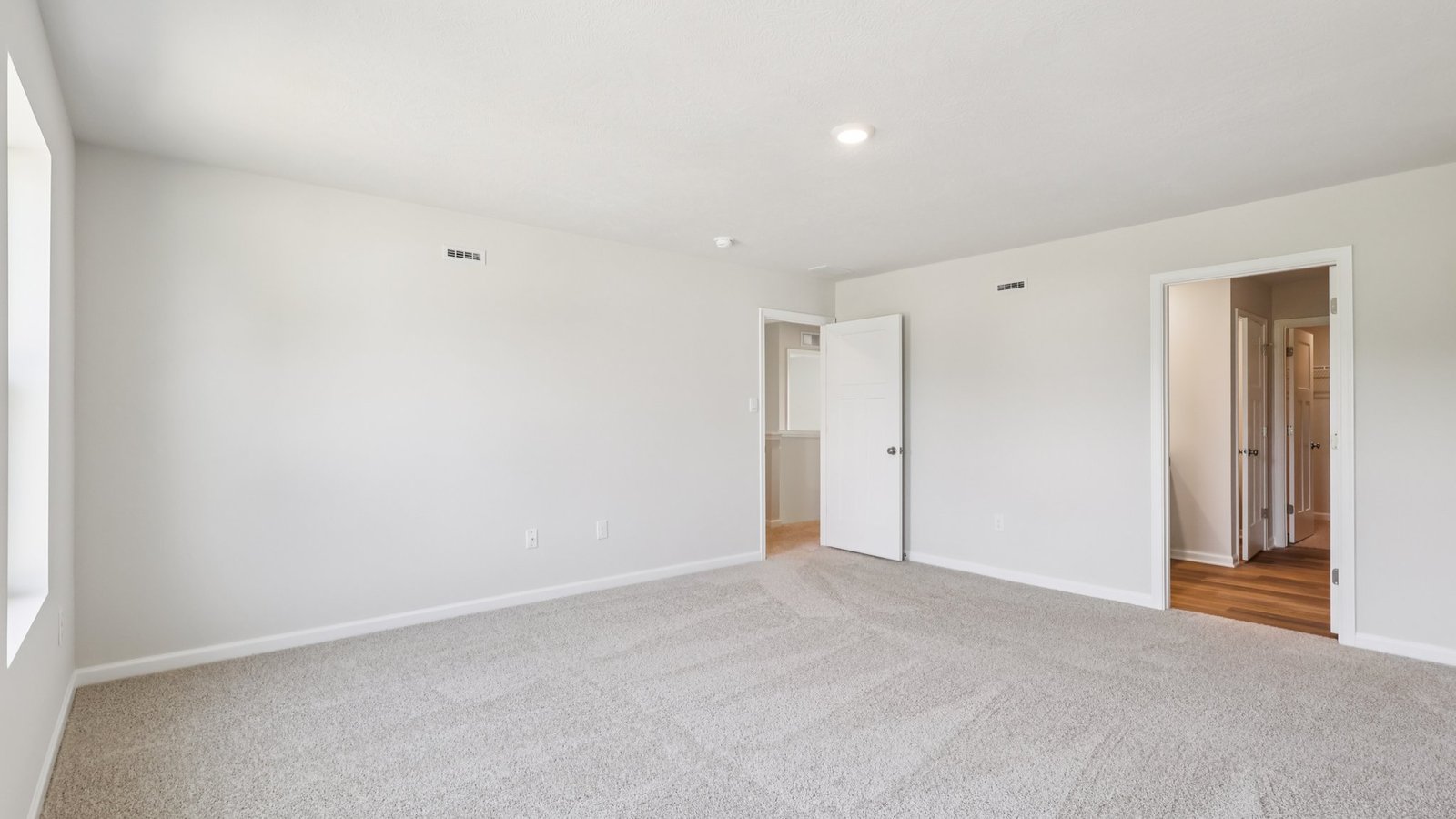 primary bedroom with ensuite bath