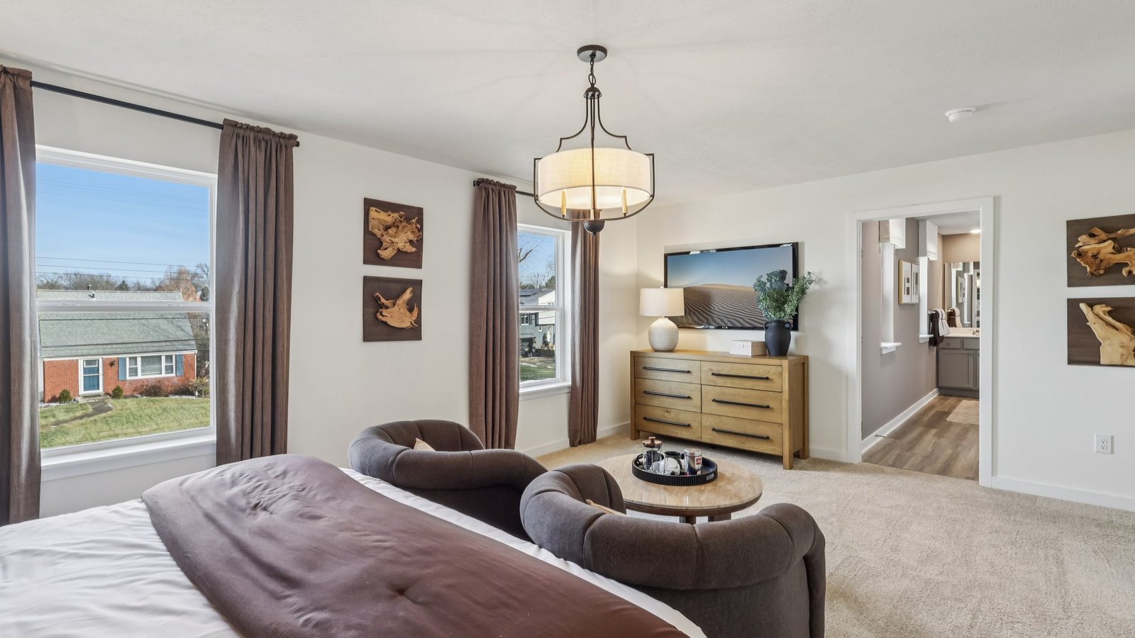 primary suite with large windows