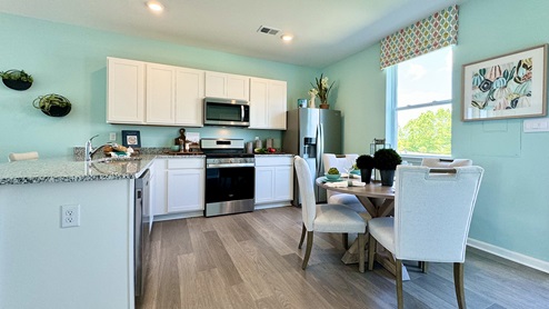 The kitchen has space for a dining area.