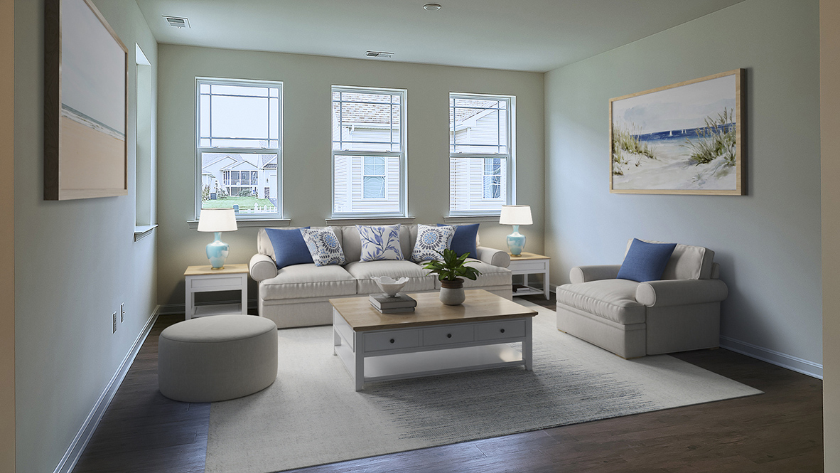 The open kitchen boasts a large island which opens into the large living area.