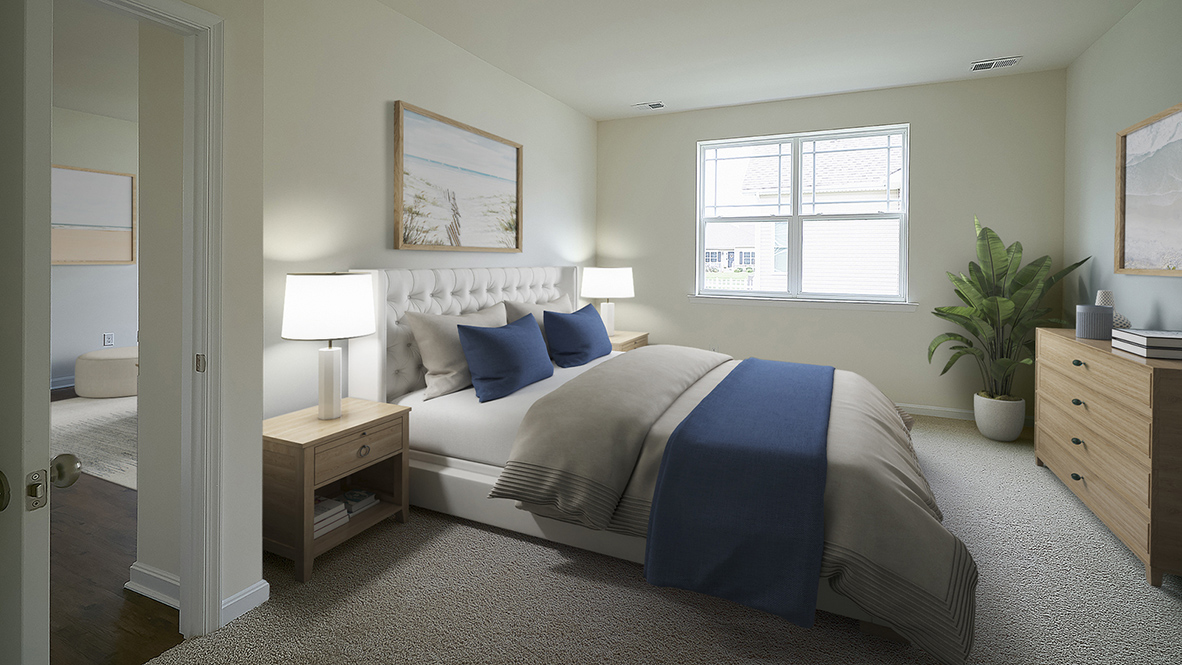 The owner’s suite with a private bathroom and a walk-in closet is a retreat in the back of the home.