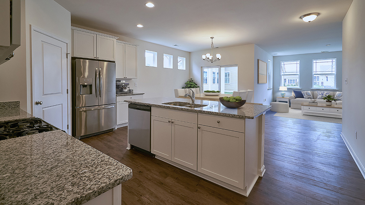 The open kitchen boasts a large island.