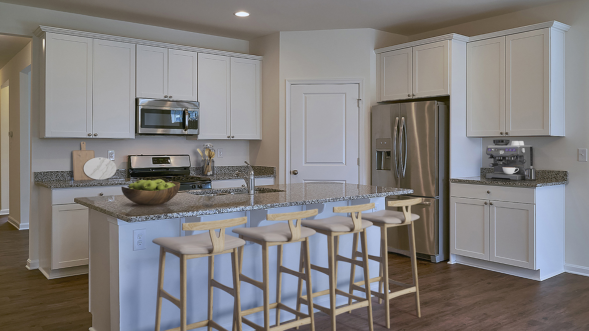 The well-designed kitchen boasts plenty of cabinets