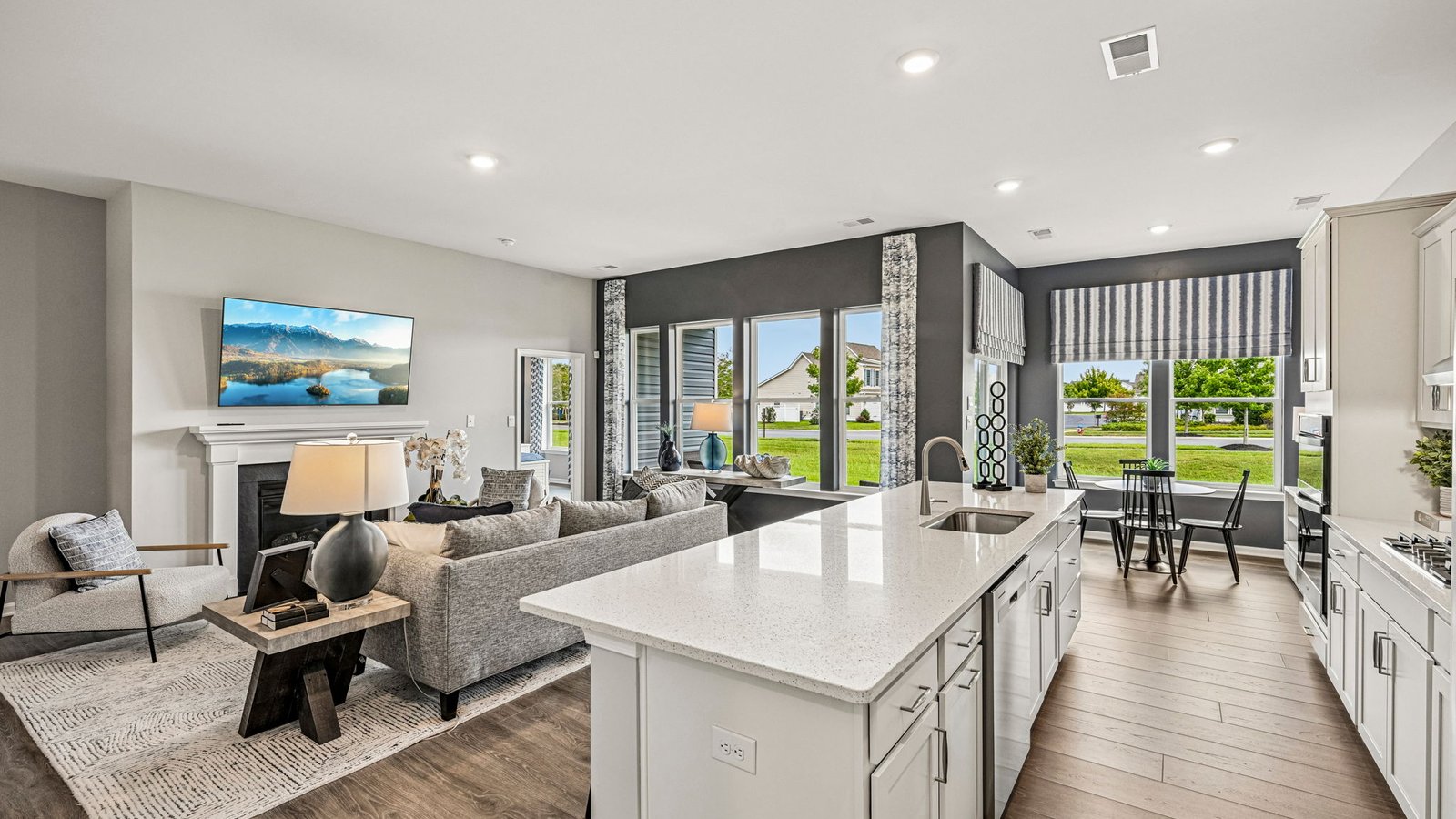 The kitchen is open to the great room with a gas fireplace making it easy to spend time with friends and family.