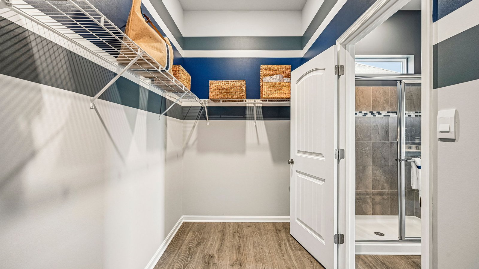 The private owner’s suite is a retreat in the back of the home with a large walk-in closet.