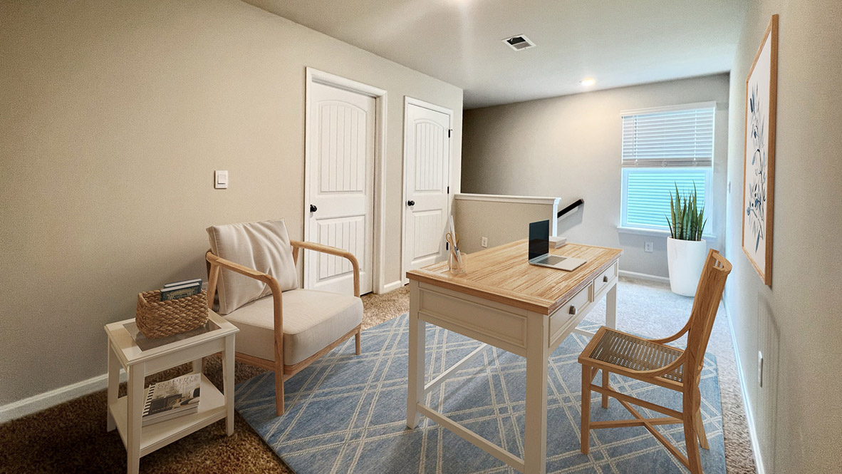 Upstairs, you will enter the inviting loft.