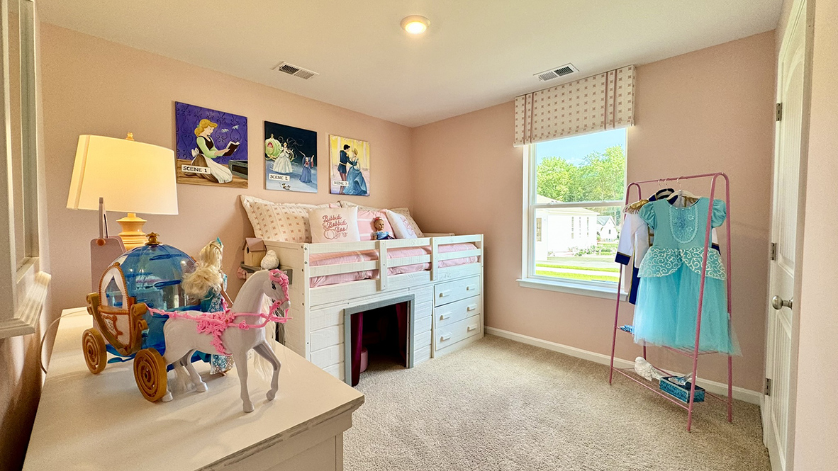 Two roomy, secondary bedrooms are in the front of the house.