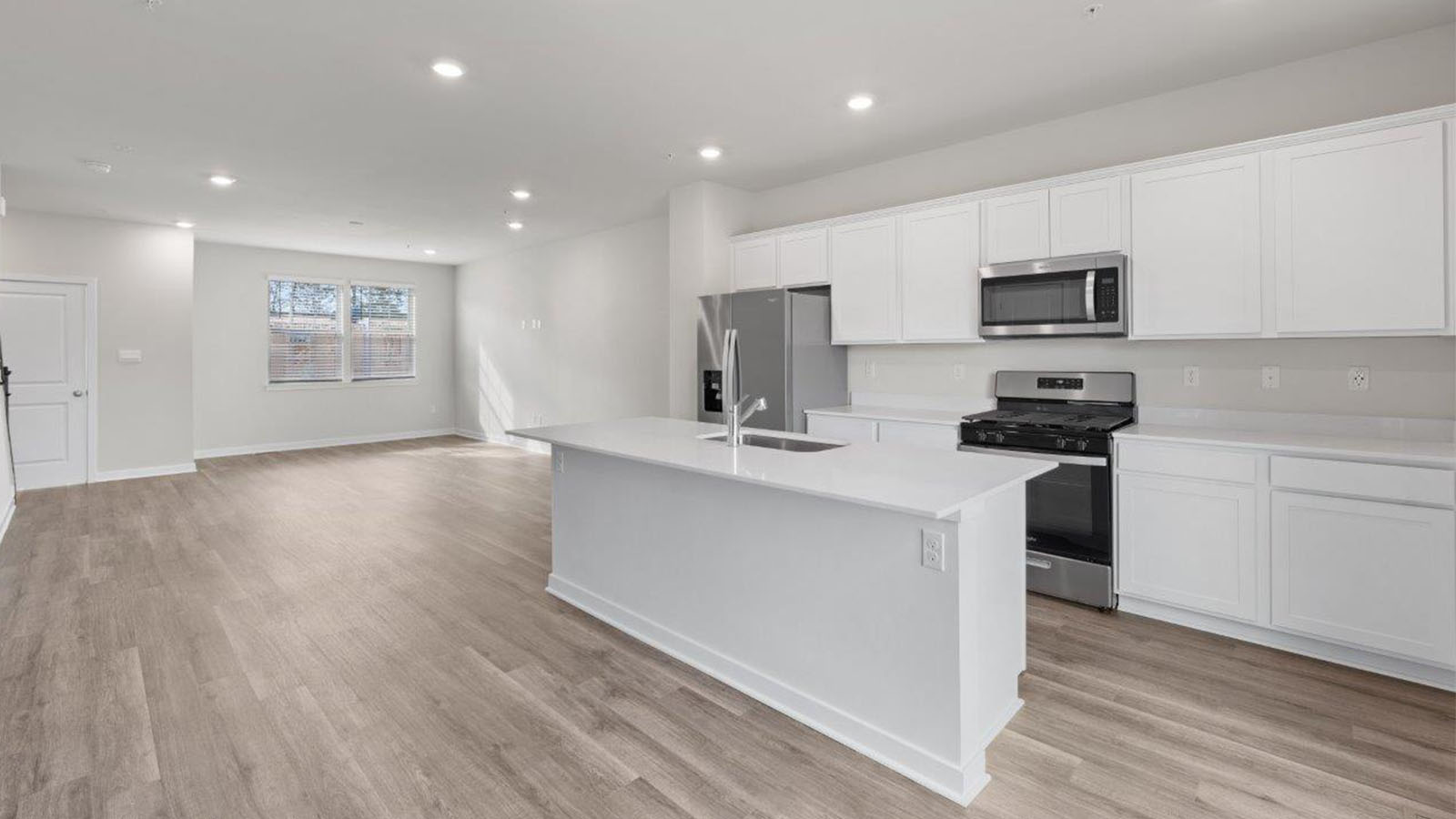 white shaker cabinets with quartz counters