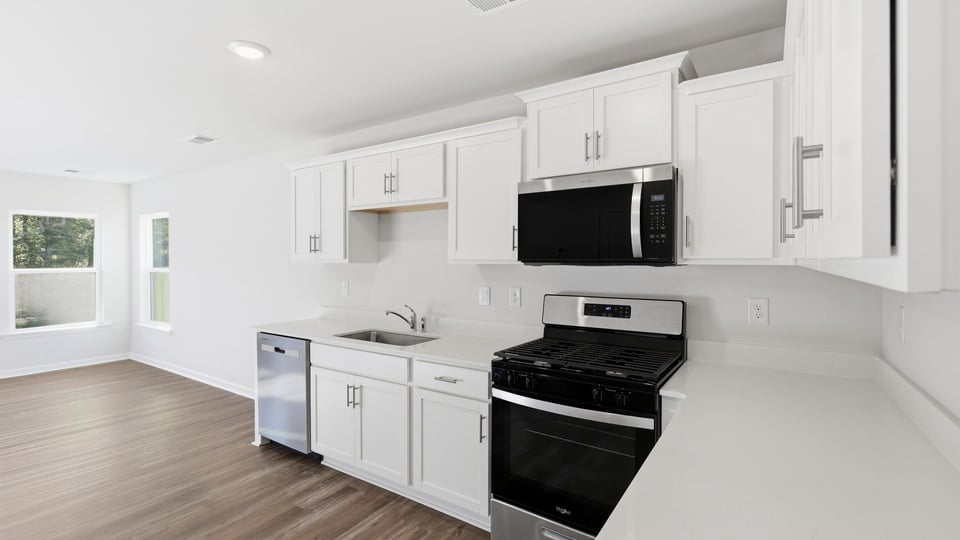 Kitchen with stainless steel appliances.