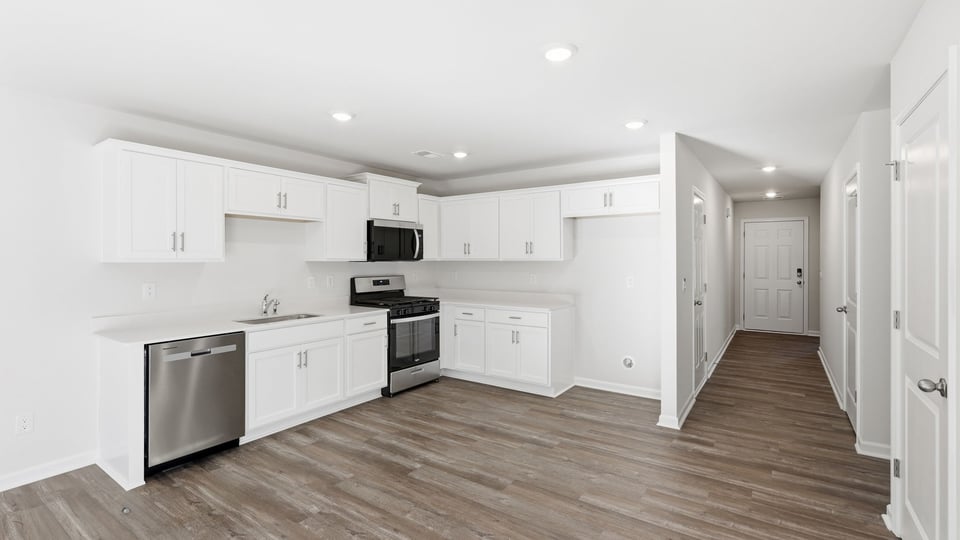 Kitchen with stainless steel appliances.