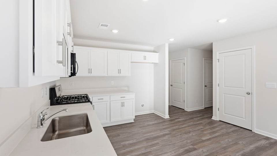 Kitchen with stainless steel appliances.