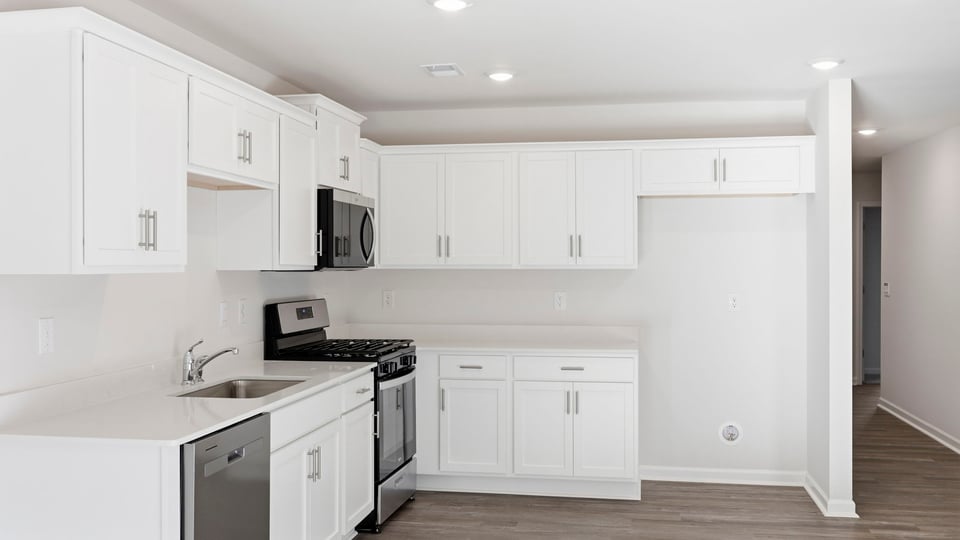 Kitchen with stainless steel appliances.