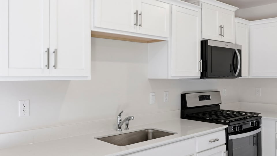 Kitchen with stainless steel appliances.