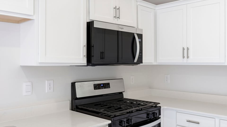 Kitchen with stainless steel appliances.