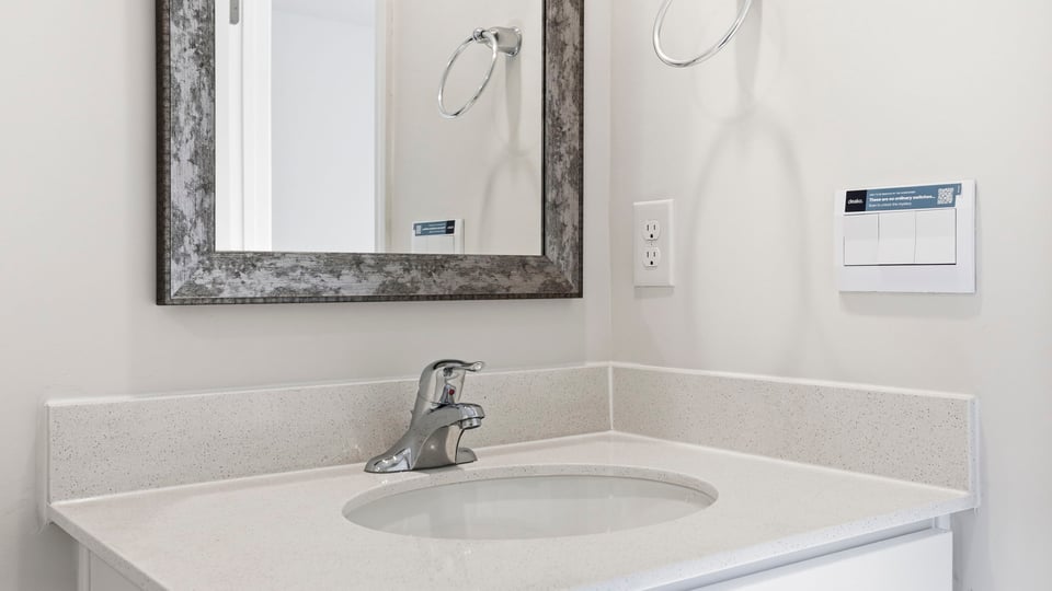 Bathroom with single vanity sink.