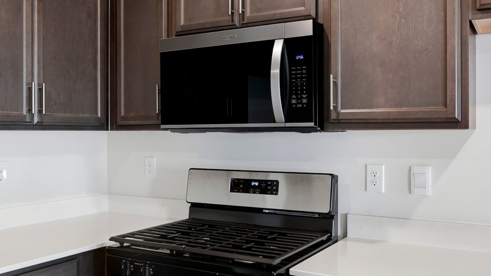 Kitchen with stainless steel appliances.