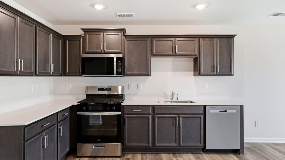Kitchen with stainless steel appliances.