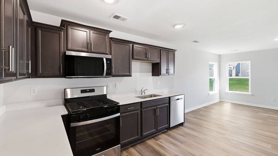 Kitchen with stainless steel appliances.