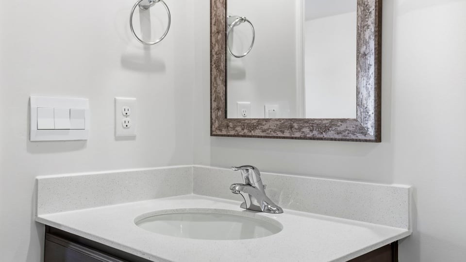Bathroom with single vanity sink.