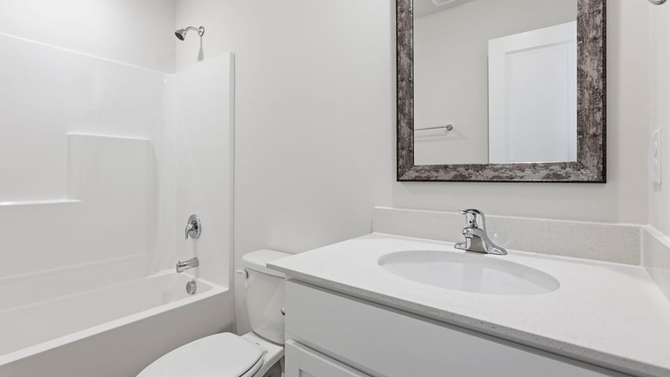 Bathroom with single vanity sink.