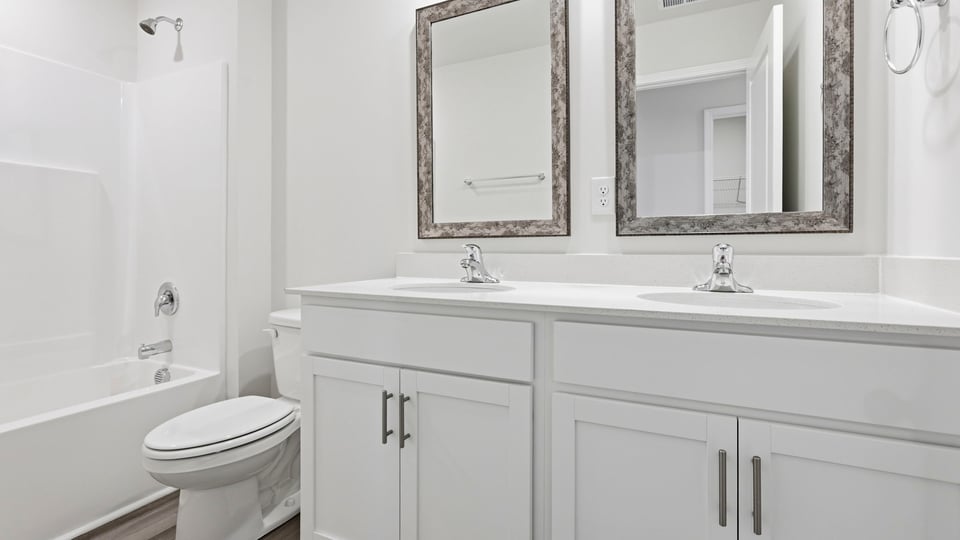 Bathroom with double vanity sink.