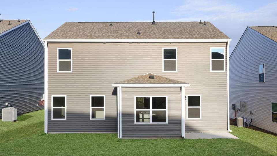 Back exterior with patio.