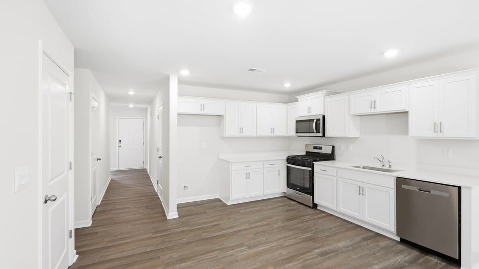 Kitchen with stainless steel appliances.