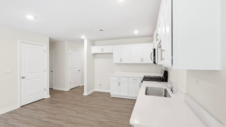 Kitchen with stainless steel appliances.