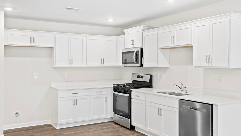 Kitchen with stainless steel appliances.