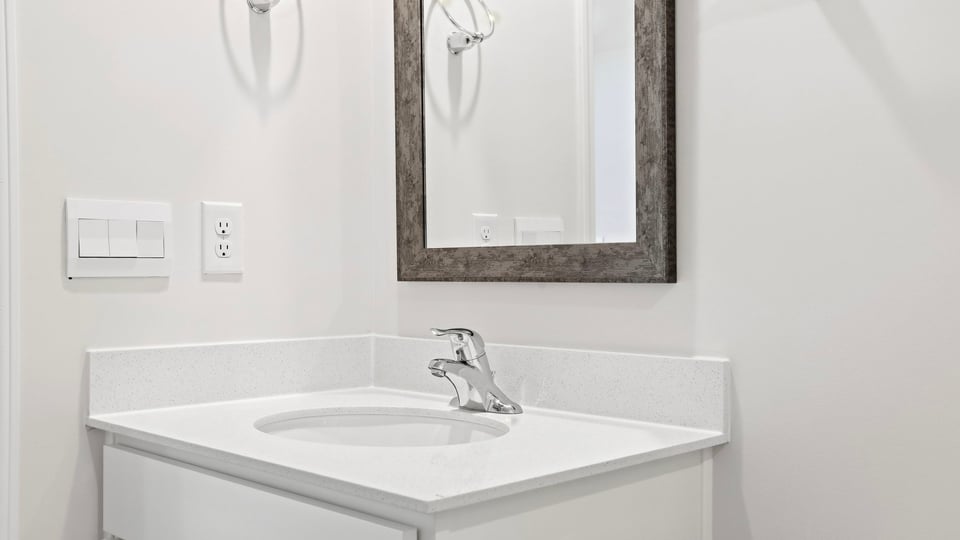 Bathroom with single vanity sink.