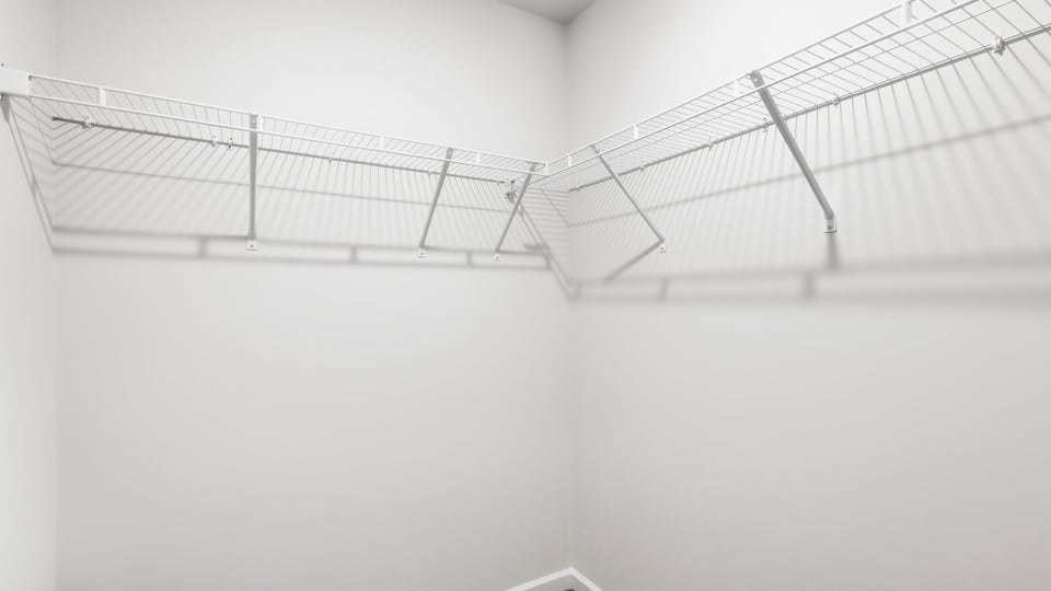 Closet with hanging storage racks.