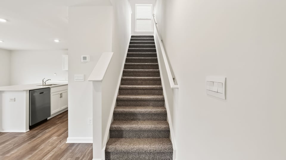 Stairs to second level.