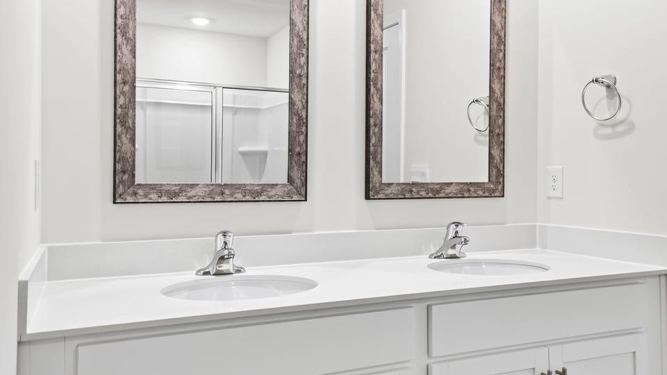 Bathroom with double vanity sinks.