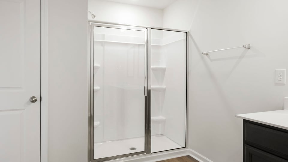 Primary bathroom with double vanity sink.
