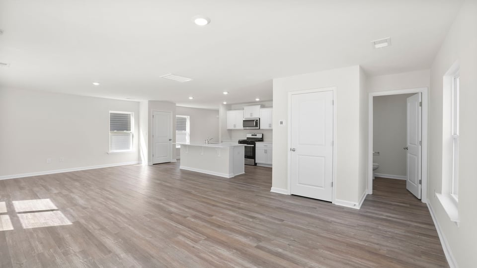 Family room with windows.