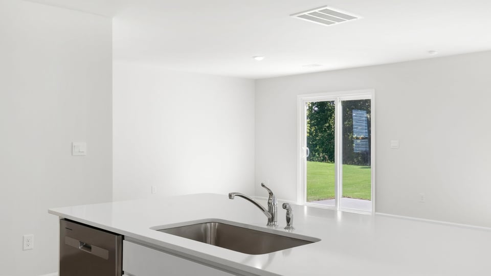 Kitchen with stainless steel appliances.