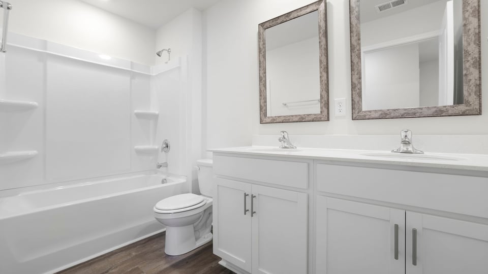 Bathroom with double vanity sink.
