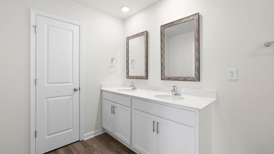 Bathroom with double vanity sink.