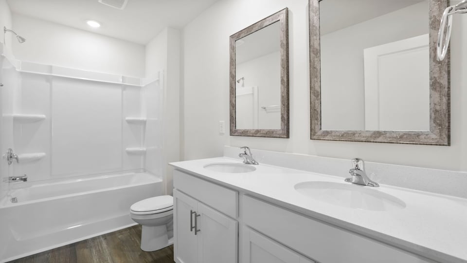 Bathroom with double vanity sinks.