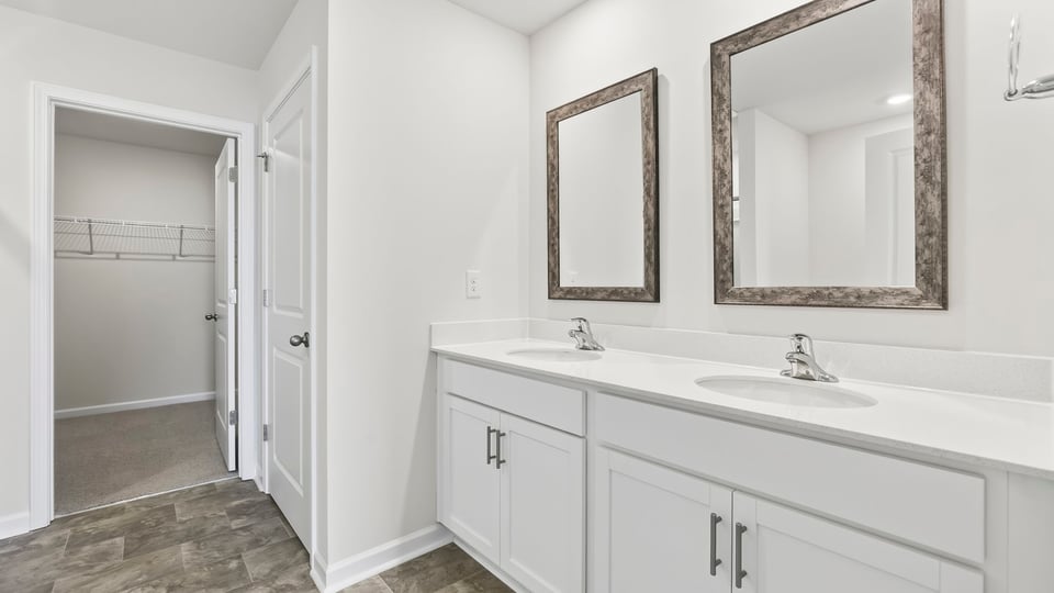 Primary bathroom with double vanity sink.