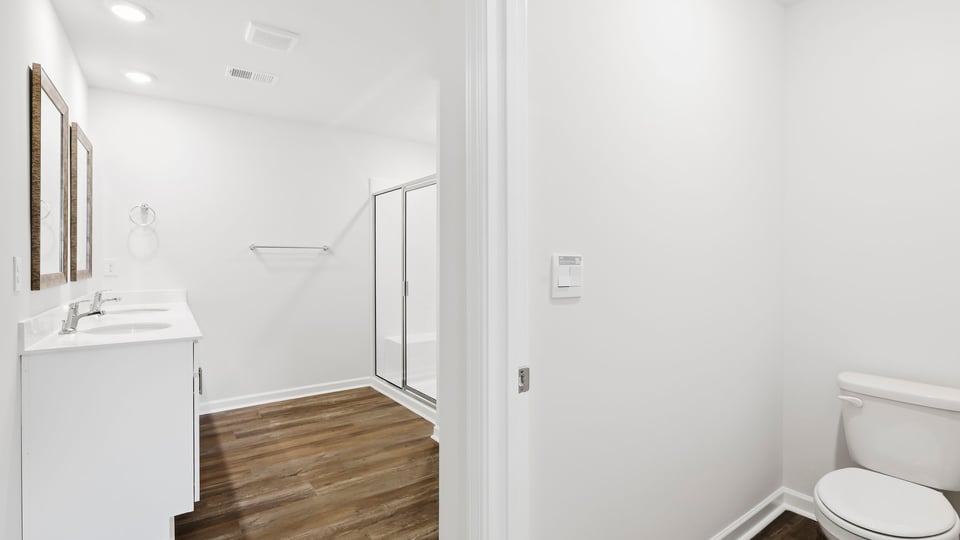 Bathroom with walk in shower.