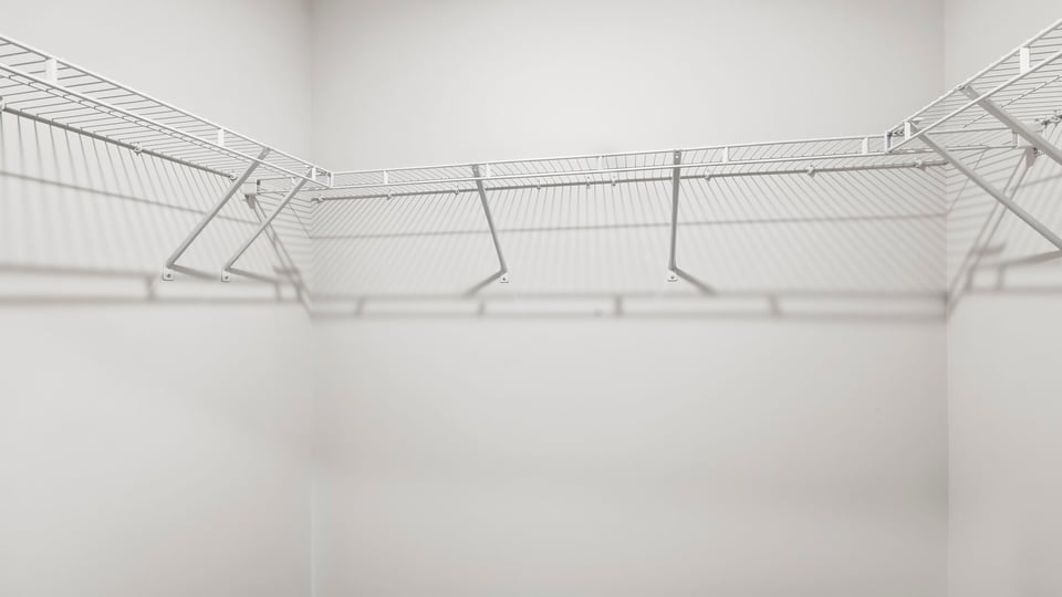 Closet with hanging storage racks.
