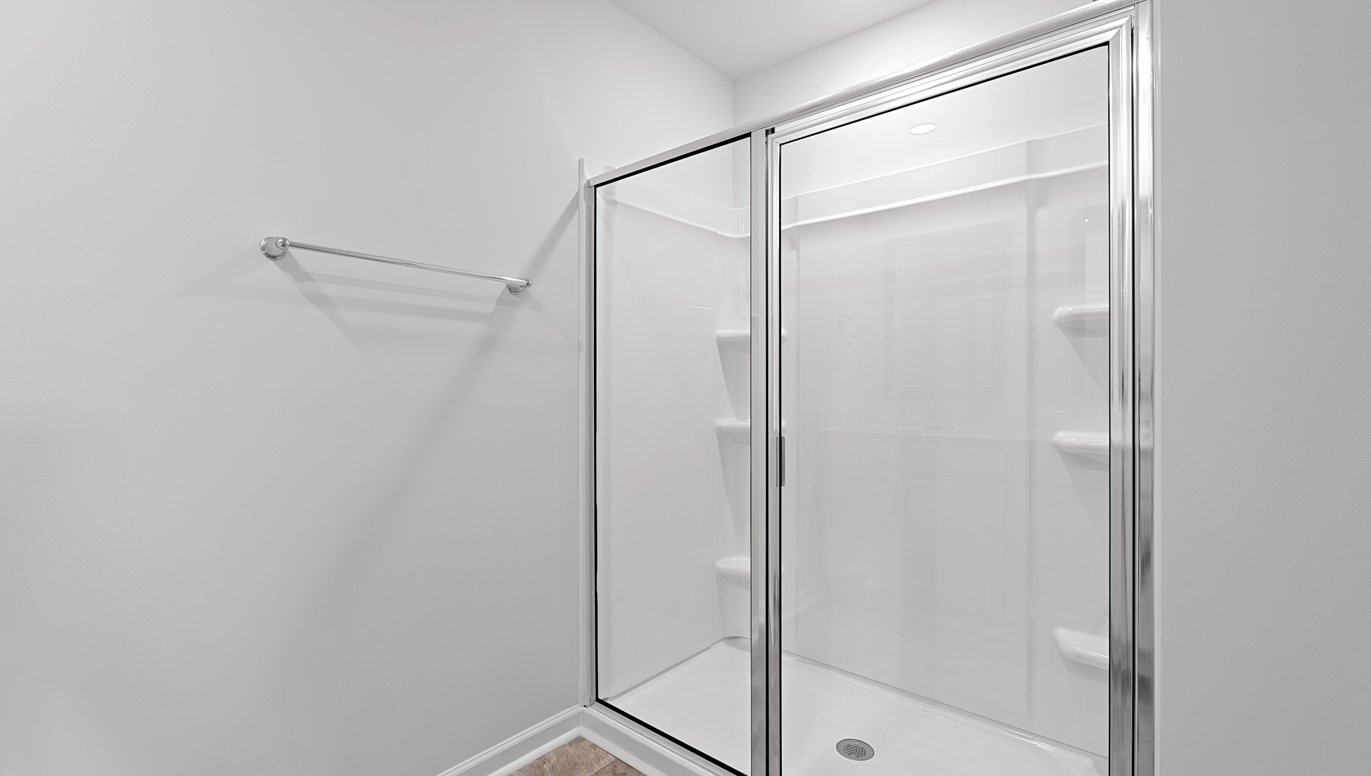 Bathroom with walk in shower.