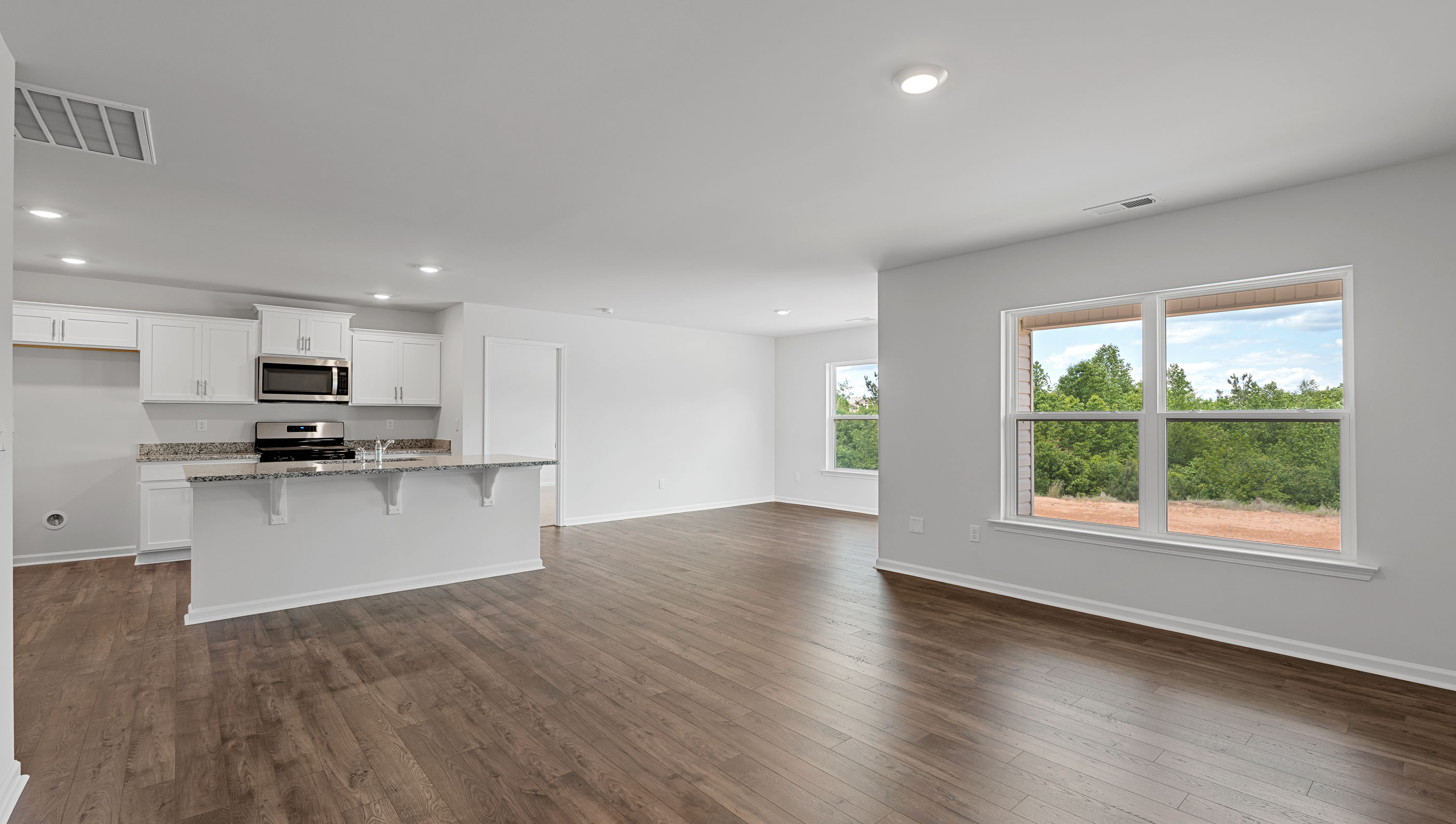 Kitchen with island countertops.