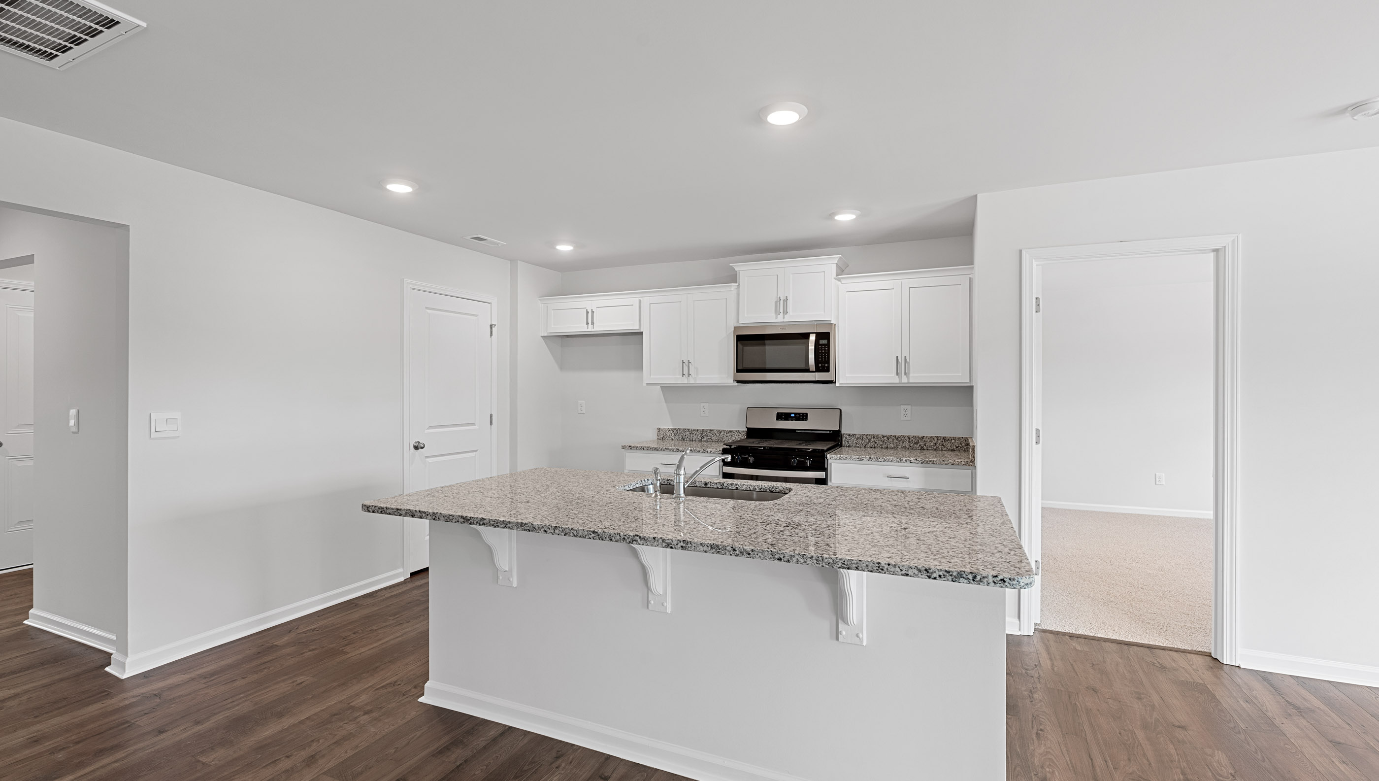 Kitchen with island countertops.