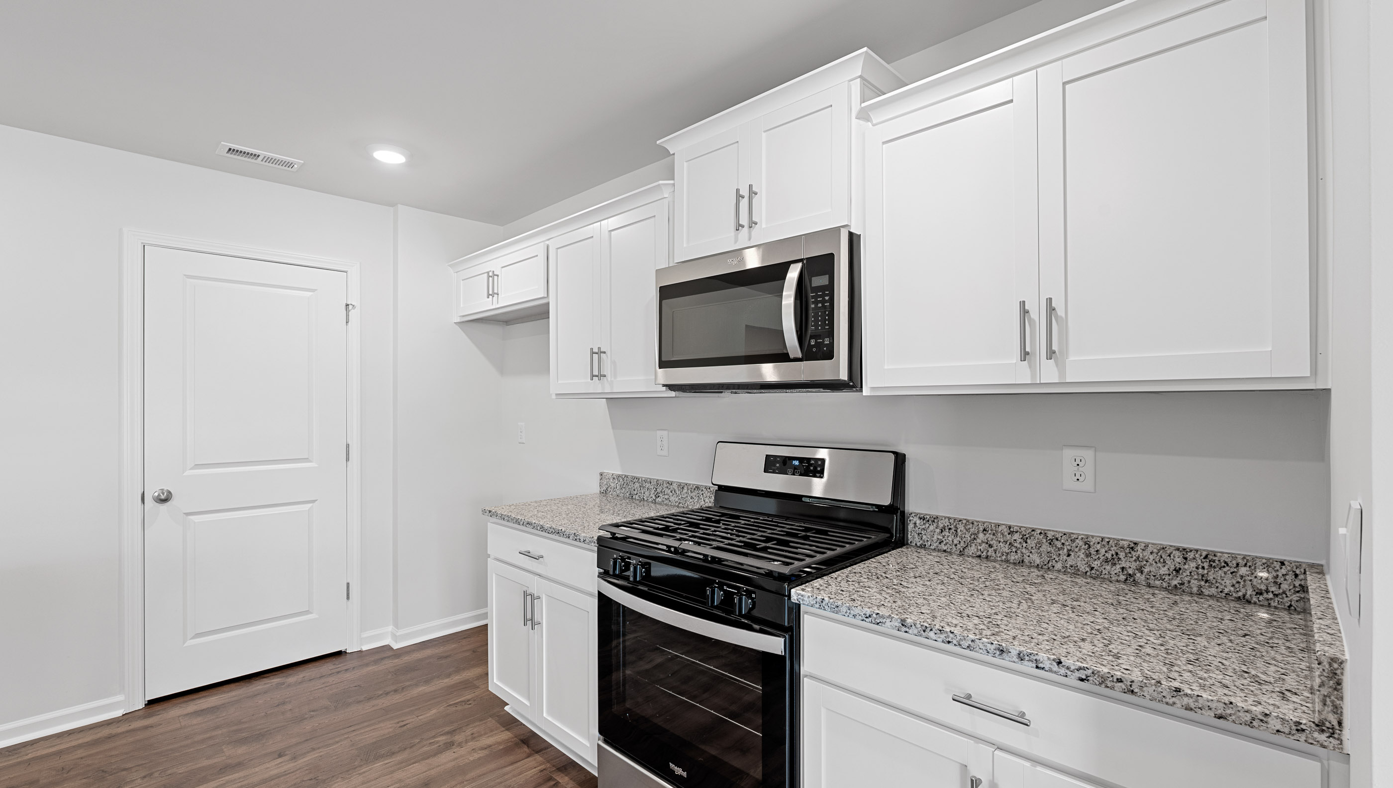 Kitchen with island countertops.