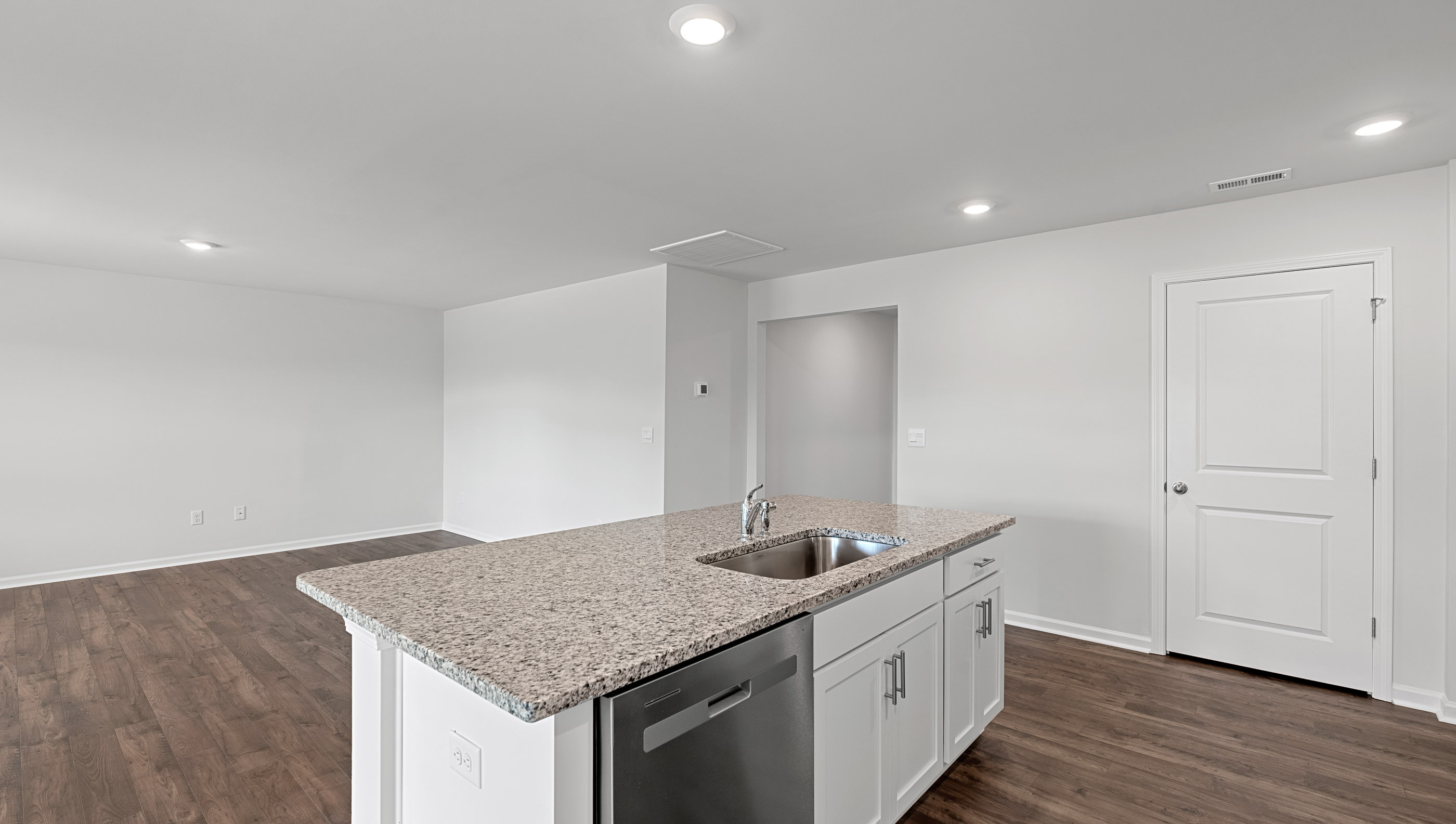 Kitchen with island countertops.