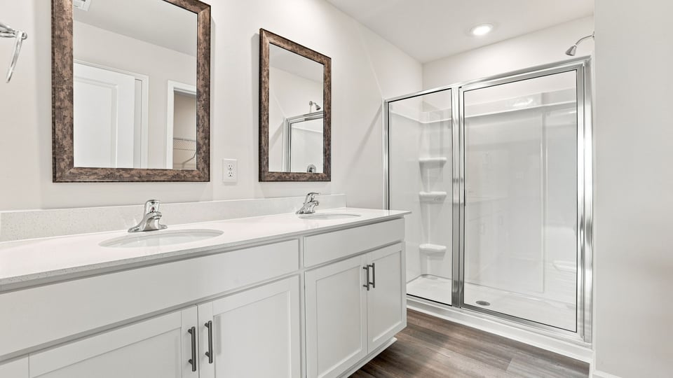 Primary bathroom with double vanity sink.